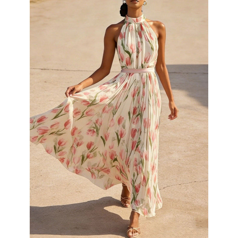 Woman wearing a floral dress on a concrete surface