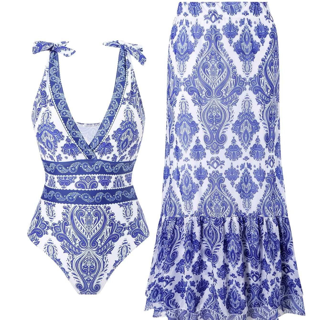 Navy Blue and white floral swimsuit and skirt set on a white background