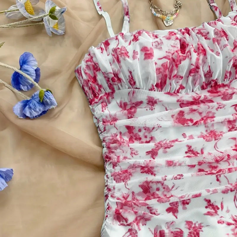 Close-up of a red floral dress with a blurred background
