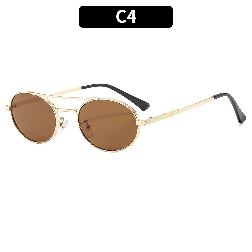 Gold-framed sunglasses with brown lenses on a white background