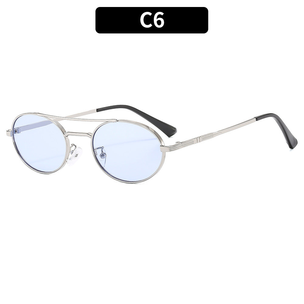 Round sunglasses with metallic frame and blue lenses on a white background