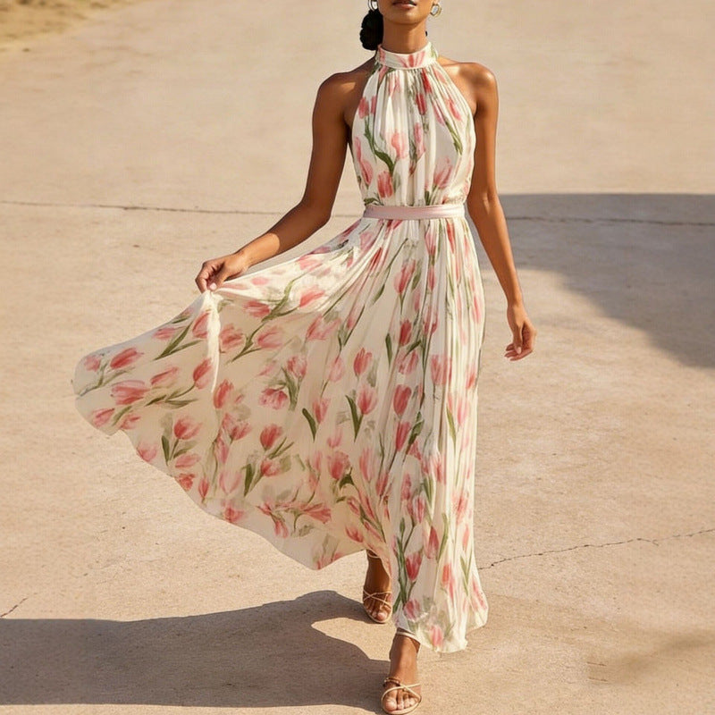 Woman wearing a floral dress on a concrete surface