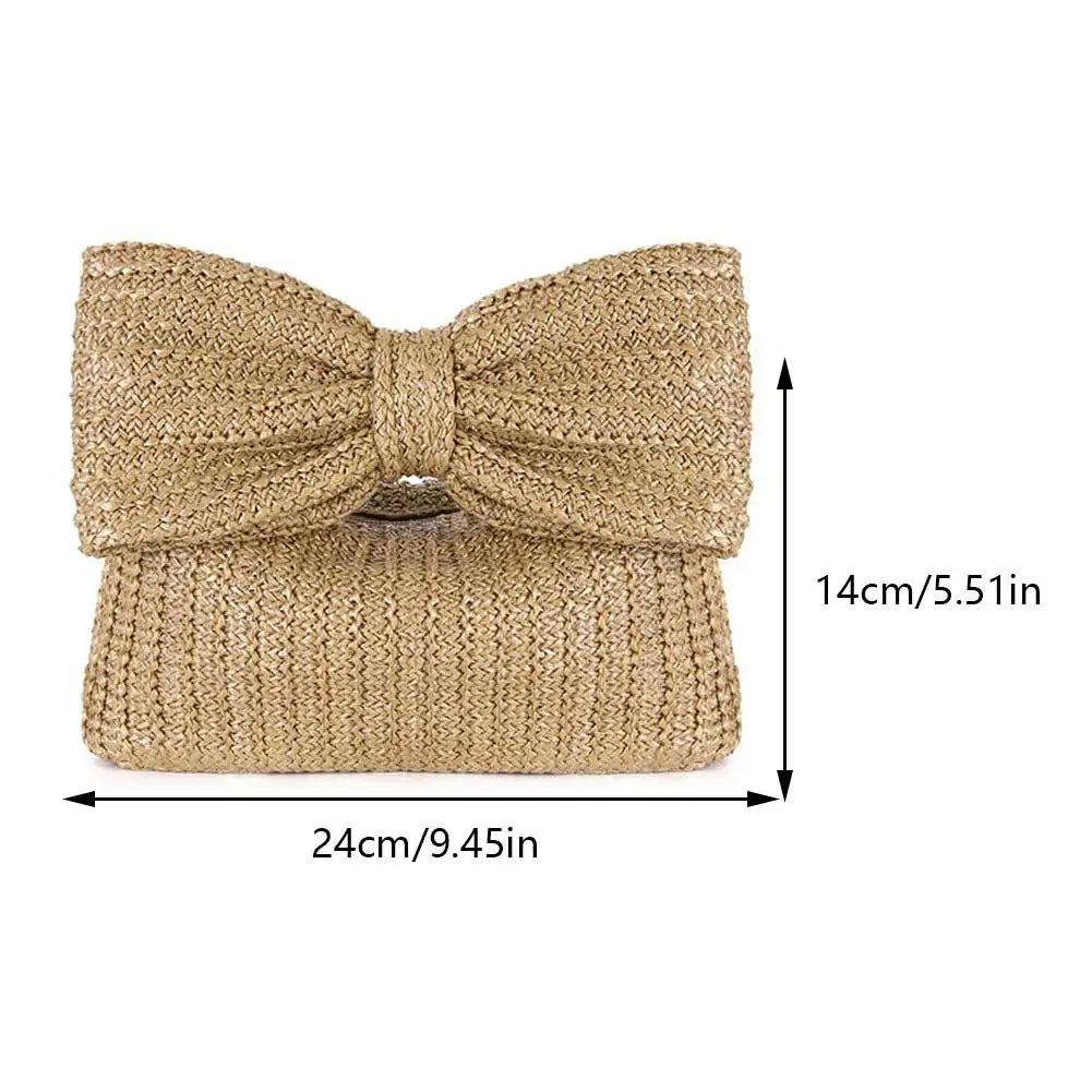 Beige straw clutch with a large bow and measurements on a white background