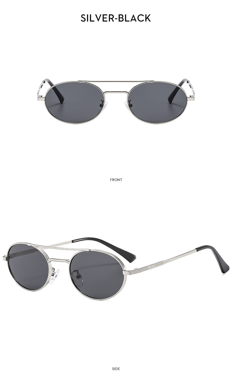 Round sunglasses with silver frames and dark lenses on a white background.