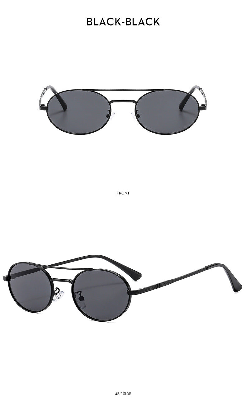 Round sunglasses with silver frames and dark lenses on a white background.