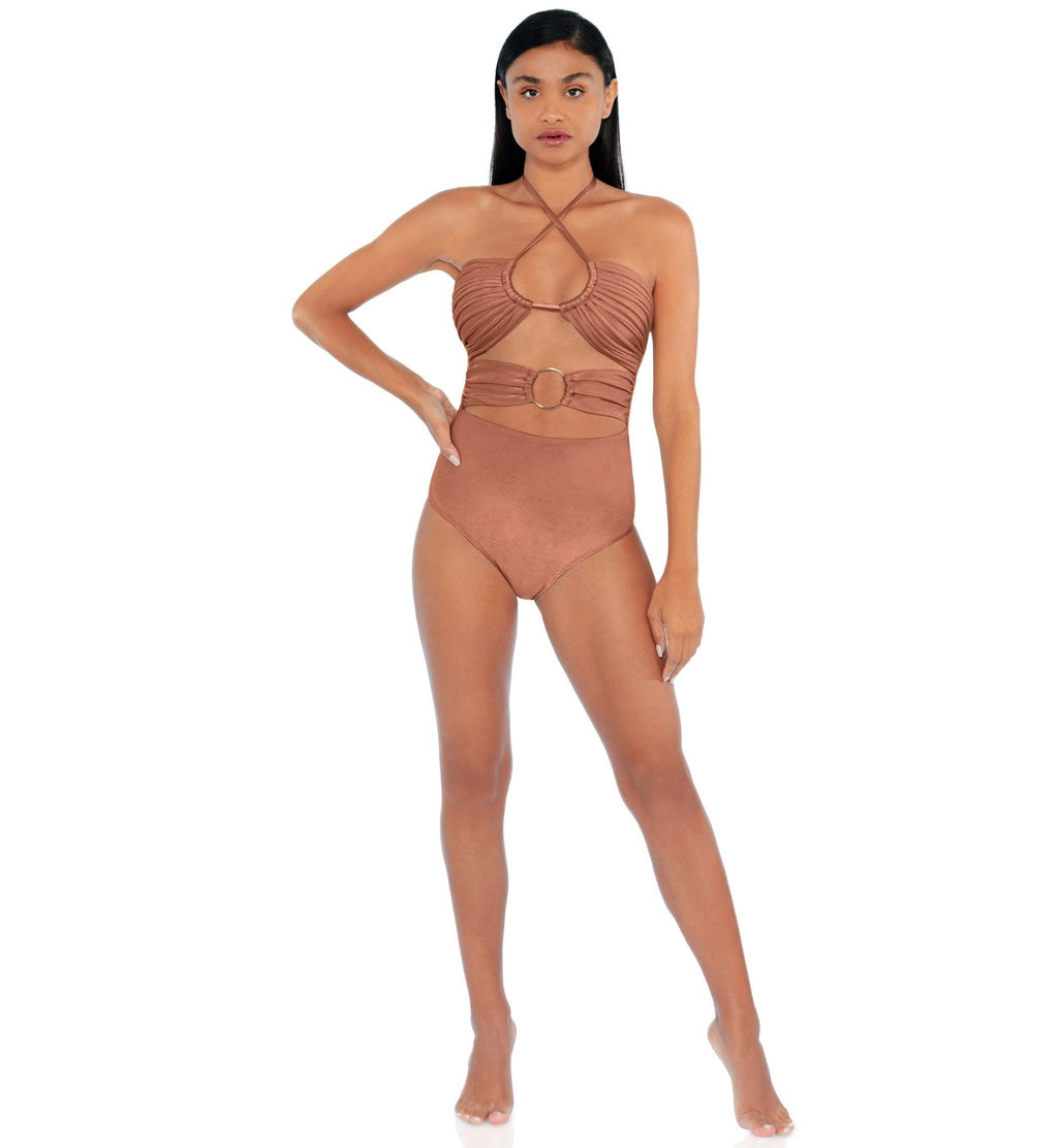 Woman wearing a brown swimsuit on a white background