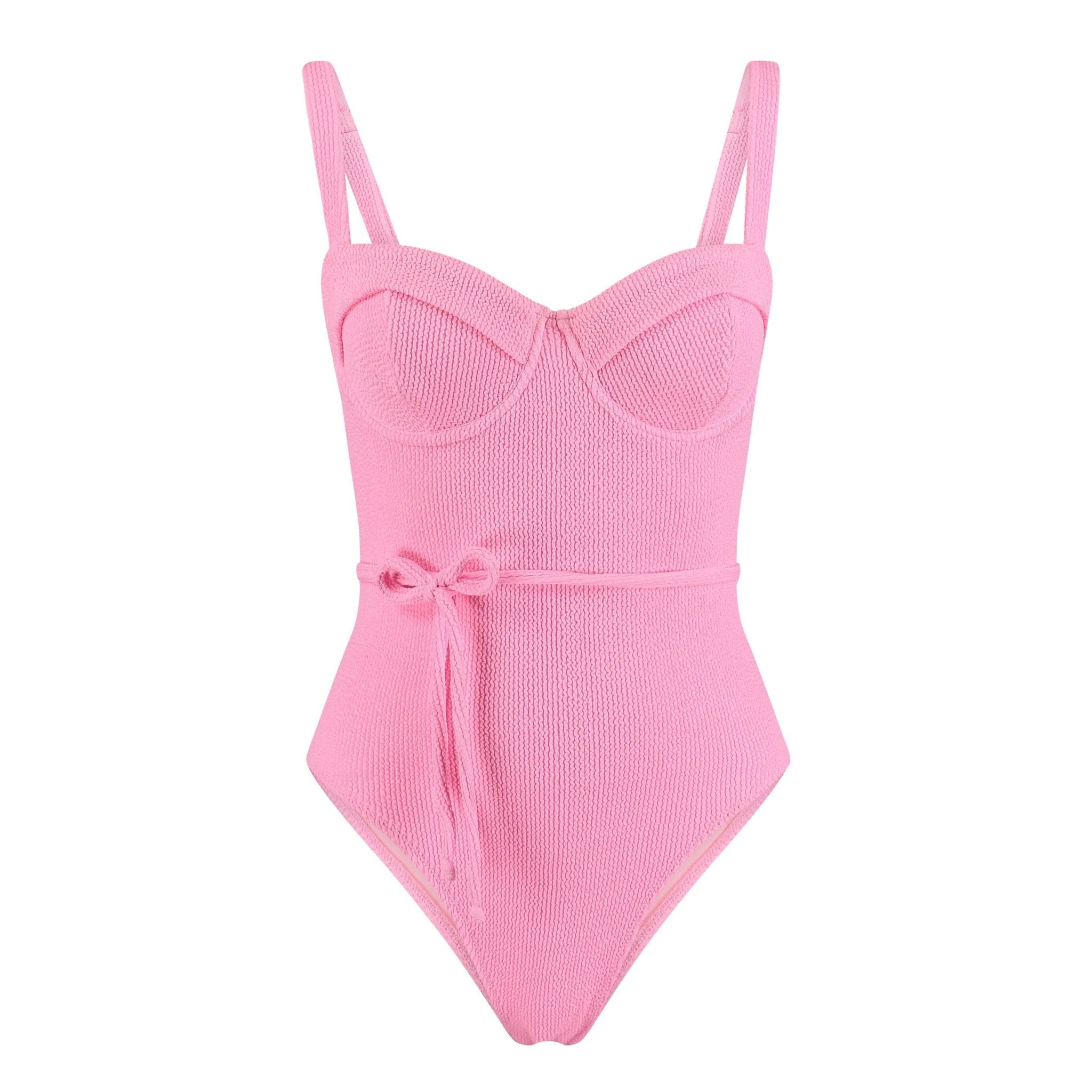 Pink ribbed swimsuit with thin straps on a white background